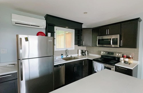 Moncton Villa | Modern Designer Villa Condo in Prime Location with Exclusive Amenities".