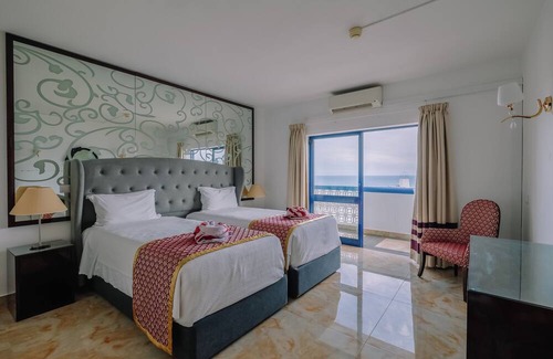 Oura Hotel | Beachfront 5-Star Hotel with Indoor & Outdoor Pool! 3 Spacious Units w/Kitchens