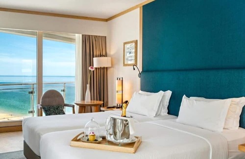 Santiago Hotel | Idyllic Beachfront Room w/Ocean Balcony for a Relaxing Coastal Stay