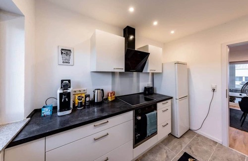 Hulzweiler Apartamento | Serviced apartment with fully furnished workspace