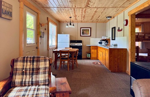 Trout Lake Cabina | Updated Rustic Cabin #5 at Twin Cedars on Frenchman Lake in Trout Lake, MI