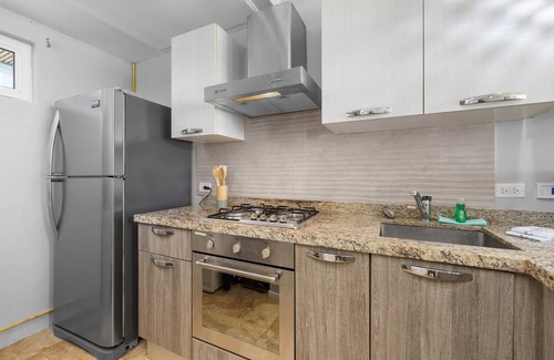 Boegoeroei Condominio | 2 bedrooms and 2 baths in a tropical setting. Amazing outdoor spaces and a very convenient location. Less than 2 miles from stunning Eagle Beach and the High-rise hotel district with shopping, casinos and restaurants.