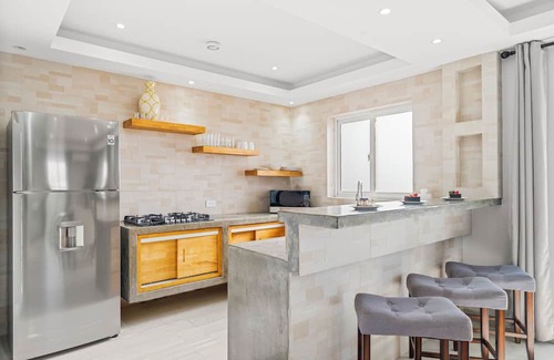 Ponton Apartamento | Spacious 2BR Aruba Home with a Pool, BBQ, Full Equipped Kitchen & Gated Backyard