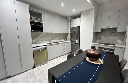 Menlyn Apartamento | Luxury continental apartments (2 units) in a lifestyle block with concierge.