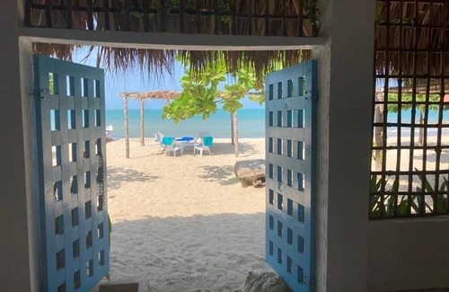 Rincon Apartamento | Spacious beachfront house in Rincón del Mar, white, comfortable, fresh and bright.