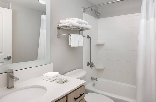 Westshore Hotel | Fully Equipped Kitchen in Modern Suite with Airport Shuttle and Swimming Pool