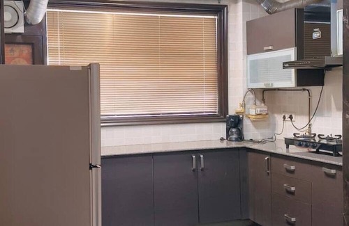 Greater Kailash Apartamento | 2 BHK near M Block Market GK-1 by HostMyStay