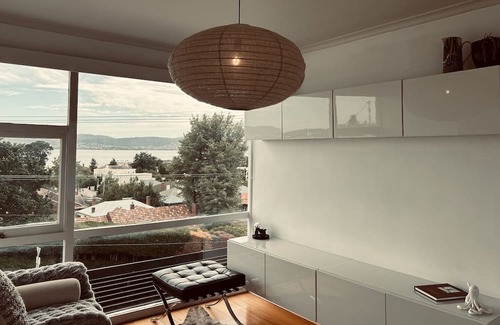 Sandy Bay Apartamento | Panoramic water views, sunny and private - walk to beach, cafes and shops
