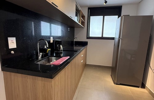 Ponta da Praia Apartamento | Cozy apartment in Santos 1, pet friendly.