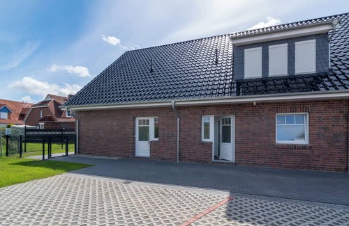 Westeraccumersiel Apartamento | Experience happy times - live centrally, enjoy peace and quiet