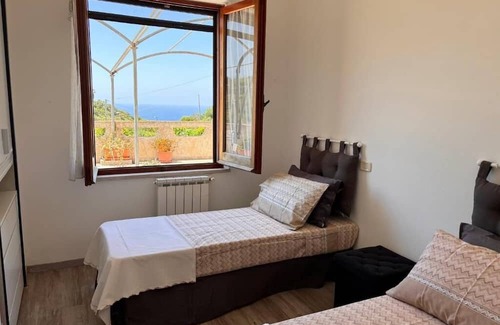 Magomadas Apartamento | Bosa Apartment large terrace with a view