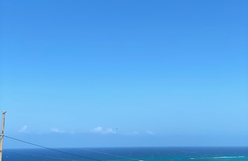 Silver Sands Apartamento | Charming 3-bedroom apartment with Pool, WiFi, AC in enchanting Duncan’s Bay