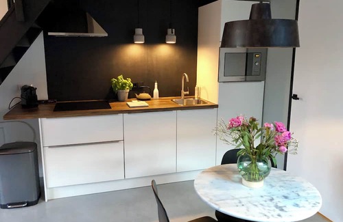 Heerlen Apartamento | Apartment in south Limburg for two people in old school with sunny garden