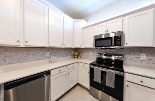 Lehigh Acres Villa | Spacious & inviting 2-bedroom, 2-bath home, designed for comfort and relaxation.
