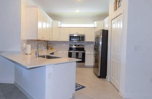Lehigh Acres Villa | Spacious & inviting 2-bedroom, 2-bath home, designed for comfort and relaxation.