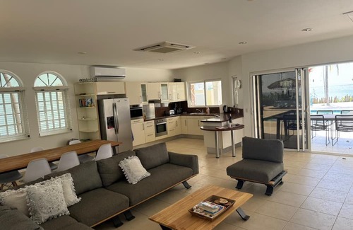 Sabadeco Casa | Crown Ridge 12 – Oceanfront home with private pool & infant of a dive site