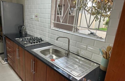 Lusaka Cabaña | Charming Mango Cottage in Lusaka – Garden Views & Free WiFi