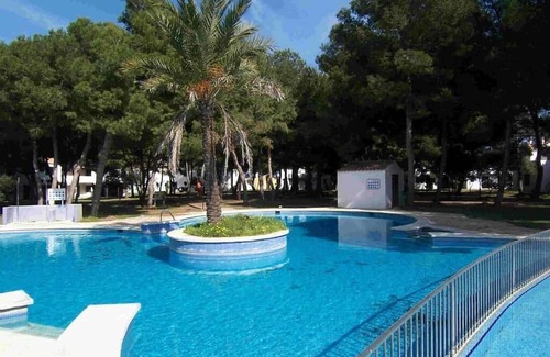 Son Xoriguer Apartamento | Apartamento Vermell Mar, ¡Relájate en su piscina de trébol inmersa en un pinar!