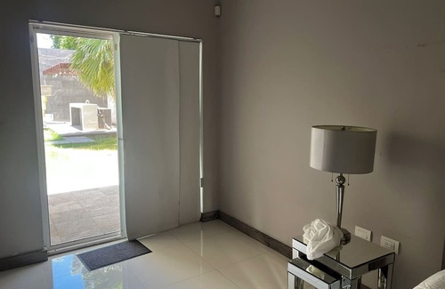 Delicias Casa | Spacious 4-bedroom house with WiFi, Pool, fitness room in welcoming Delicias