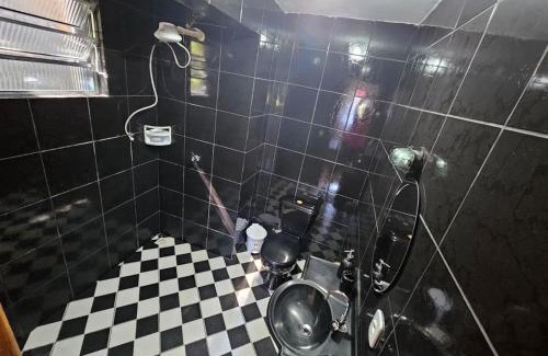 Quitandinha Casa | Suíte privativativa entrada independente com garagem