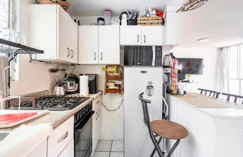 Santa María la Ribera Apartamento | Confortable departamento en el corazón de la ciudad