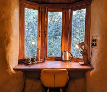 Naina Range Cama Y Desayuno | Hidden Earthen Home With An SUV Car As Entrance