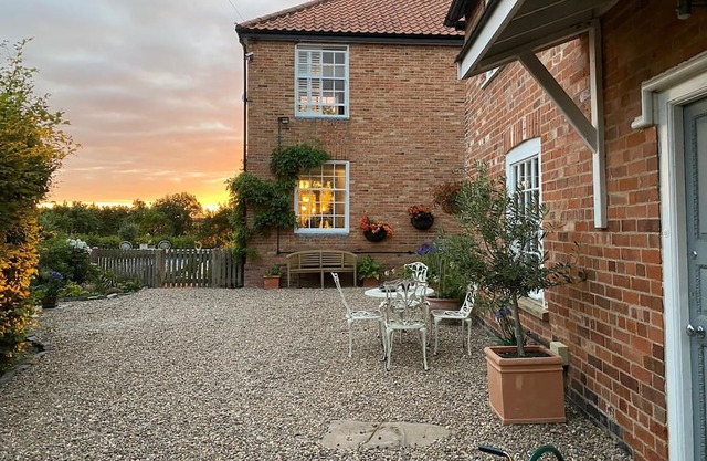 Listed self contained cottage a quiet elevated position with magnificent views