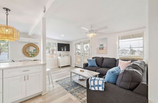 Home with fire pit, large deck, game room and close to the beach