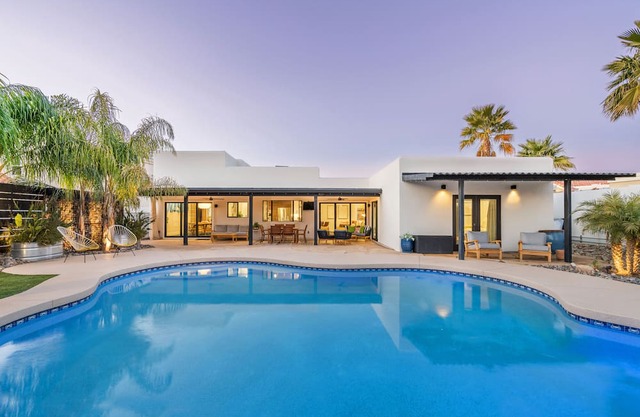 Designer dream home with opulent backyard, private pool, hot tub, game room & AC