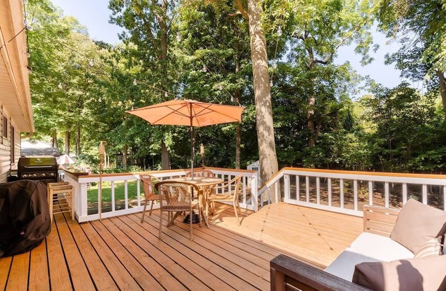 Newly remodeled home, spacious deck w/ string lights, & large yard with firepit