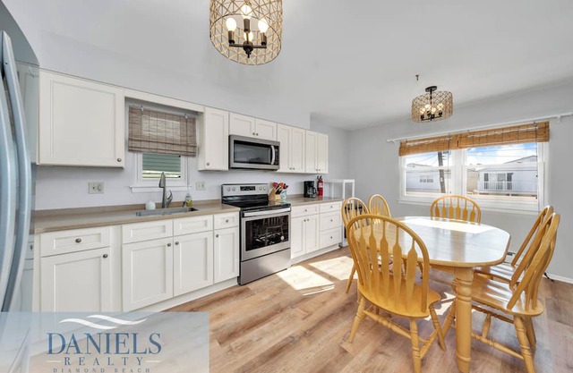 Bayside Beauty in Wildwood Crest with a large deck, bikes, and beach extras!