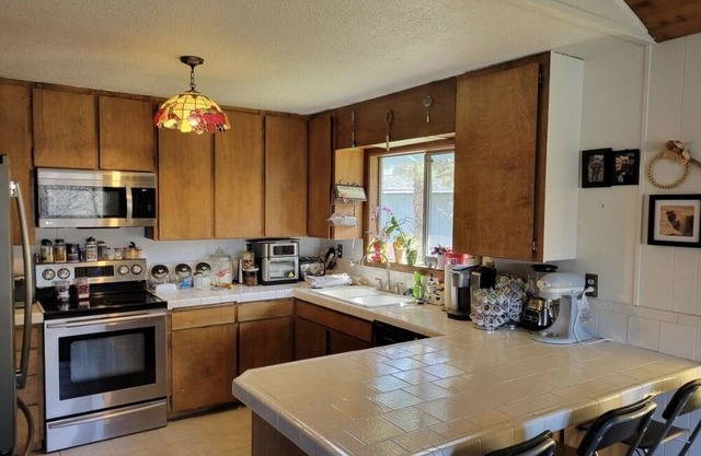 Bend beauty on 2 private acres. Just minutes from parks and downtown.