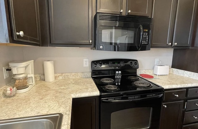 Completely furnished with full kitchen! More space than a hotel and cheaper too!