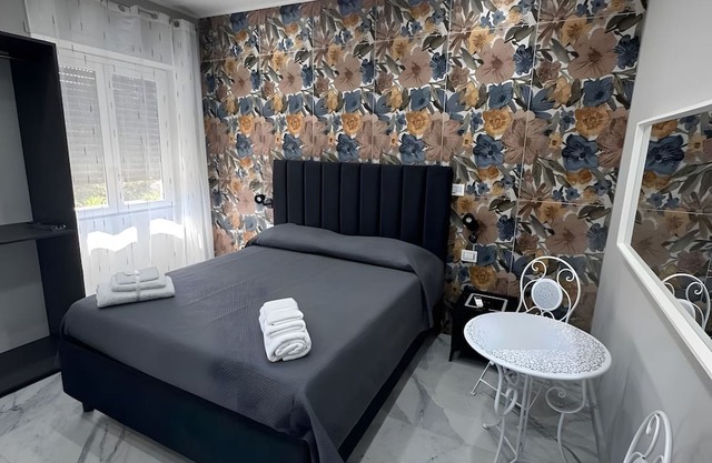 Room 'Dolce Relax - Tripla Luxury' with Wi-Fi and Air Conditioning