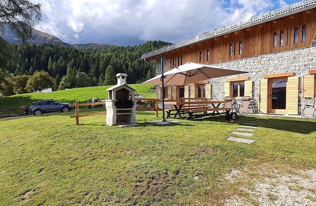 Authentic wooden chalet with panorama, fireplace and alpine flair