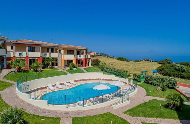 Residenza Le Farfalle 'Three-Room Apartment' with Garden View, Wi-Fi and Air Conditioning