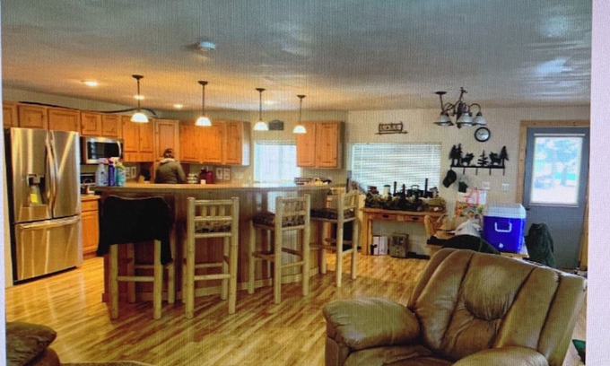 Joseph Cabina | Cozy cabin on a quiet dead end street with a large deck and outdoor kitchen