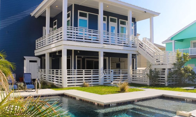 Port Aransas Casa | KD671 Luxurious Home with Private Heated Pool and Oasis, Partial Gulf Views and Golf Cart Included!