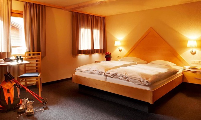 Bizau Casa | Four-bed room with half board - Hotel Wirtshaus Taube