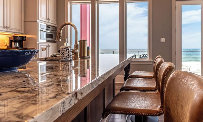 Fort Morgan Casa | Postcard views from your home equipped with a dream kitchen! Come enjoy luxurious living in a highly sought-after neighborhood in Fort Morgan.