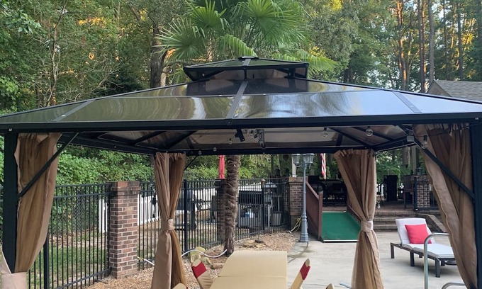 Rocky Mount Casa | treetop Paradise- pool, 6 beds, sand volleyball, outdoor Kitchen, & movie room