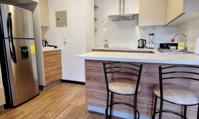 Cumbayá Apartamento | Departamento de 2 dormitorios con patio privado