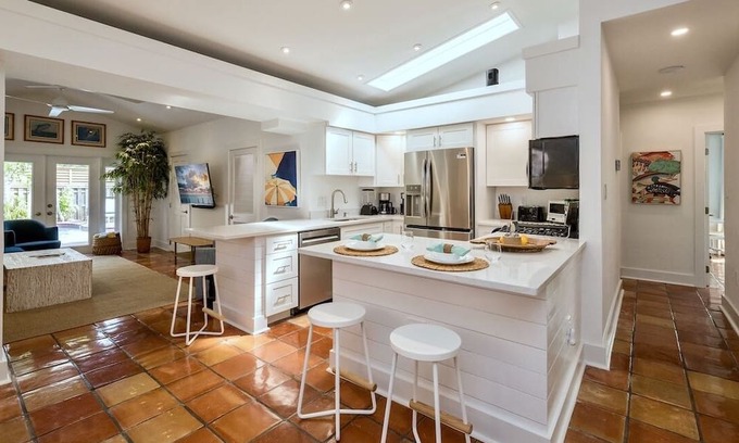 Midtown Casa | Banyan Rose: Relax in your backyard. All new appliances inside.