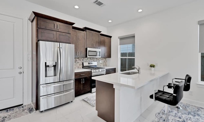 Astrodome Casa | Centrally Located Tx Medical Center - Walk To Nrg! 2 Bedroom Townhouse by RedAwning
