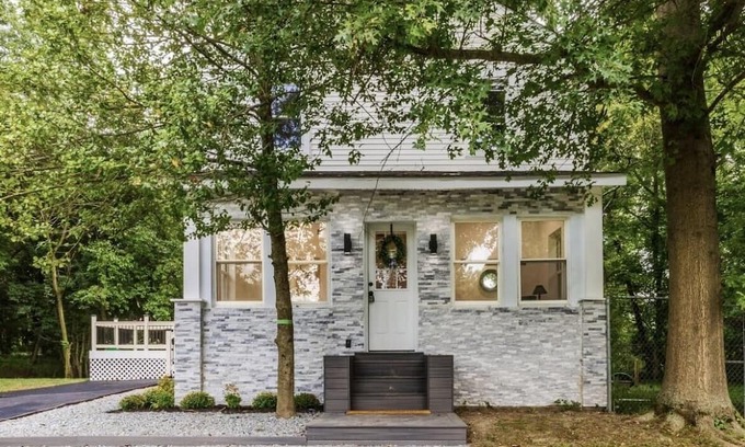 Mickleton Casa | Embrace the charm of our creekside haven featuring 4BR 3BA yoga and BBQ deck.