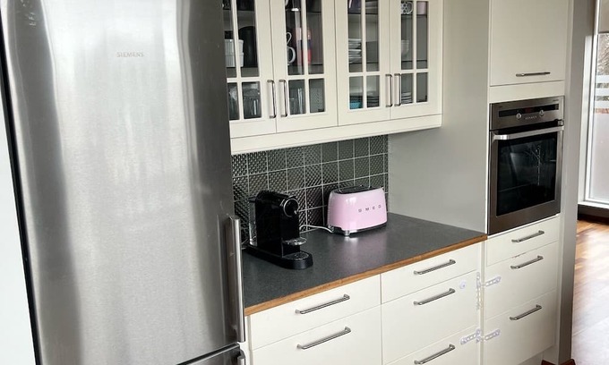 Breidholt Casa | Family friendly house 15 minutes from downtown Reykjavik - Big garden w/hot tub!
