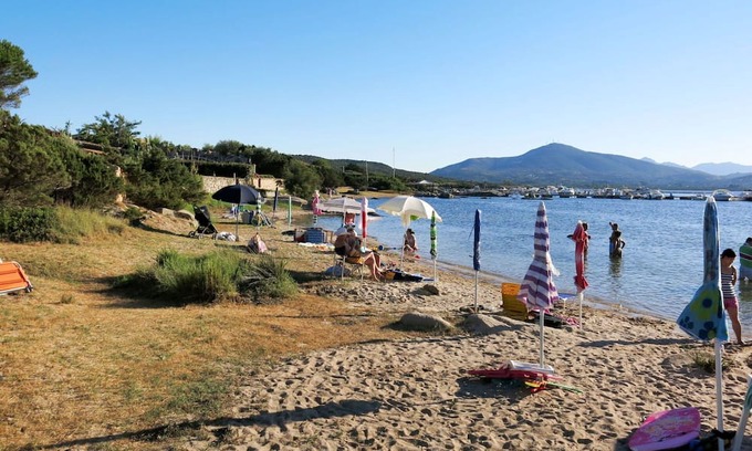 Porto Rotondo Apartamento | Lovely apartment for 2 guests with WIFI, pool, A/C, TV, terrace, pets allowed and parking