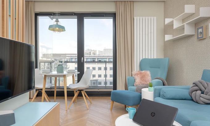 Mokotow Apartamento | Bright Blue Apartment by Renters