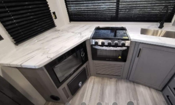 Thomson Casa | Come play with Scottish highland cows in a beautiful and cozy brand new RV!