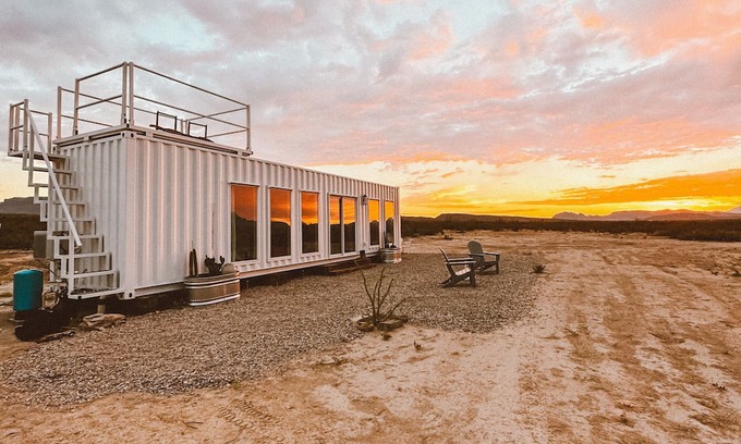 Alpine Cabina | Glow House - A Modern Container with a Stargazing Deck on Top.